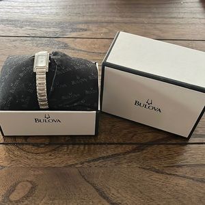 PRE OWNED SILVER BULOVA WATCH